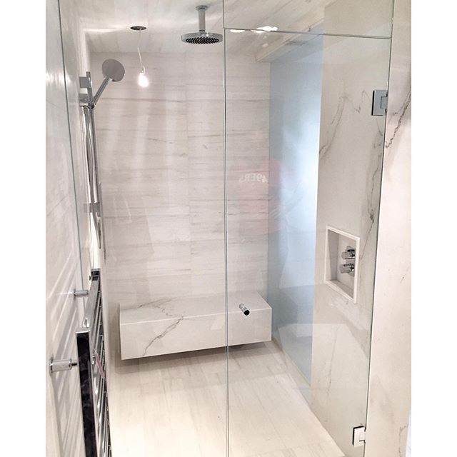WOW!!! Check out the complete and ready to use sleek bathroom from one of our current projects. Made from Calacatta Marble, you won't ever want to get out! #beautifulbathroom #design #vanarch