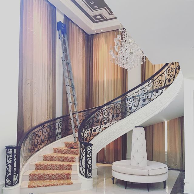 Adding the final surrounding decorative touches to an already elegant staircase. #grandstaircase #elegant #decorator #design #furnishings #fabric #design #architecture #yvrdesign  #shadesign #almostcomplete