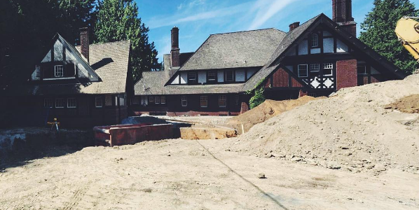 Excavation underway for heritage home restorations, construction will begin soon.